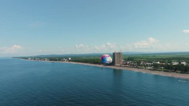 Beach Resort with Parasailing Balloon and Ocean View