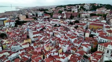 Aerial View of a Dense European City with Red Roofs