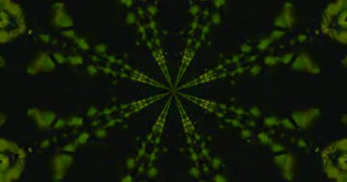 Canlı kaleydoskopik ışıkların kusursuz döngüsü görsel eğlence için büyüleyici bir yıldız deseni yaratıyor.