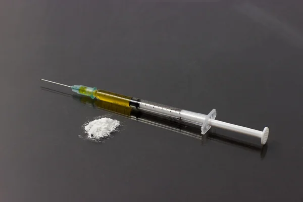Jeringa de drogas y heroína cocida — Foto de Stock