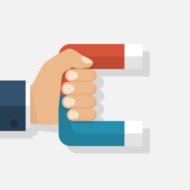 Mıknatıs elinde tutan adam