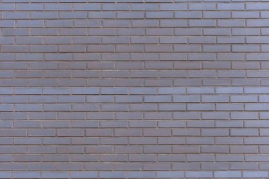 brik duvarı arkaplanı. Taş duvarın koyu dokusu. Siyah tuğla duvar. Eski brik duvarı siyah ve beyaz