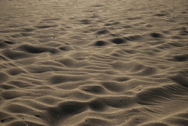 Parlak plaj kum doku kadar kapatın