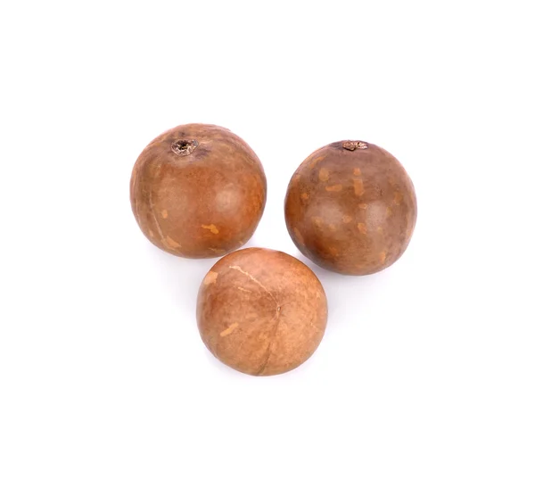 Kacang macadamia pada latar belakang putih — Stok Foto