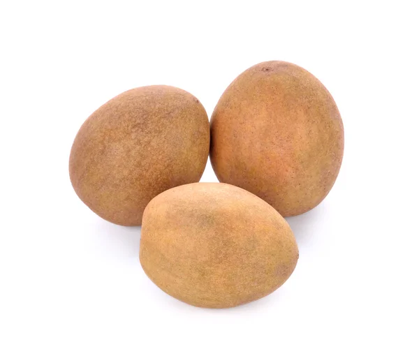 Sapodilla frukt på vit bakgrund. — Stockfoto