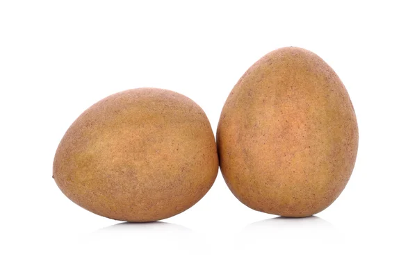 Beyaz arka plan üzerinde sapodilla meyve.