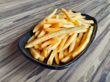 Lezzetli ev yapımı, baharatlı patates kızartması.