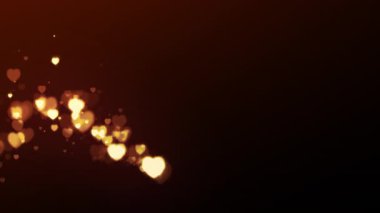 Altın parıldayan kalp parçacıkları koyu arkaplanda yumuşak bokeh ışığında kıvrılıyor. Sevgililer Günü için romantik film tasarımı, düğün ya da aşk teması. 4K canlandırması.