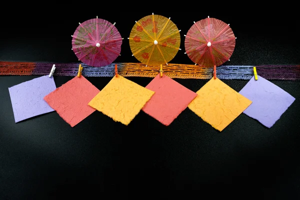 Party concept - colorful paper umbrellas, copy space — Stock Photo, Image