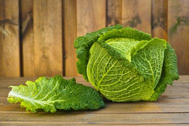 Single head of fresh green Savoy cabbage