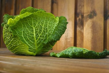 Single head of fresh green Savoy cabbage