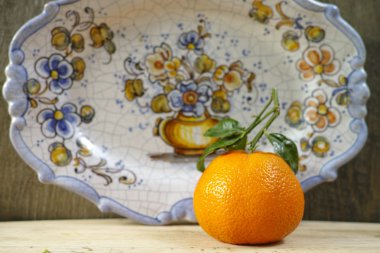 Spain concept, fresh mandarin oranges fruit with green leaves