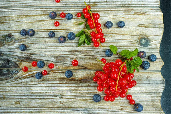 Fresh organic strawberry, blue and red berry — Stock Photo, Image