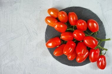 Taze olgun mini marzano domates alanı Kopyala