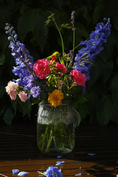 Sun after rain - colorful flowers bouquet in the garden — Stock Photo, Image