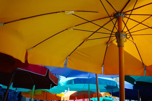 Colorful umbrellas in beach cafe — Stock Photo, Image