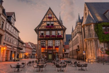 QUEDLINBURG, GERMANY, 28 JULY 2020: Main square of Quedlinburg old town at sunset clipart