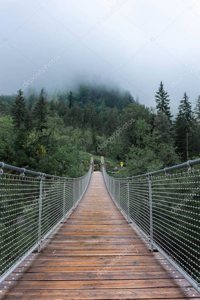 The Hangebrucke, hanging wooden bridge in the forest of Berchtesgaden National Park in Germany