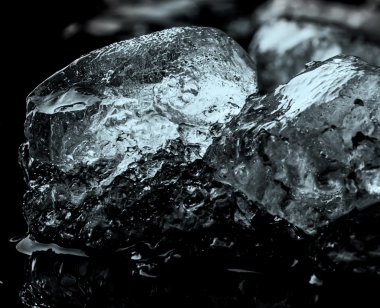 Ice cube focused and defocused part of cube.Closeuo