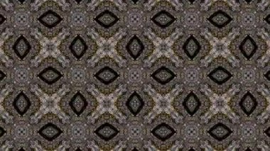 Bu video, simetrik desenli ve düzgün hareketli soyut kaleydoskop görsellerini büyülüyor. Sakinleştirici ve sürükleyici bir görsel deneyim yaratmak için tasarlanan bu dijital animasyonlar, tekrarlayan geometrik formları, uyumlu