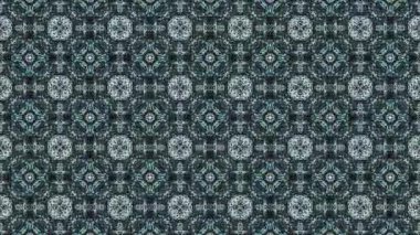 Bu video, soyut simetrik görselleri, doğal taş dokularından esinlenerek, kaleydoskopik hareketle akışkan organik kalıplara dönüştürülür. Kusursuz hareket ve dengeli bileşim gizli simetriyi ortaya çıkarıyor.