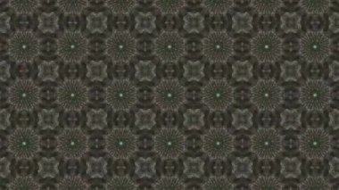 Bu video, soyut simetrik görselleri, doğal taş dokularından esinlenerek, kaleydoskopik hareketle akışkan organik kalıplara dönüştürülür. Kusursuz hareket ve dengeli bileşim gizli simetriyi ortaya çıkarıyor.