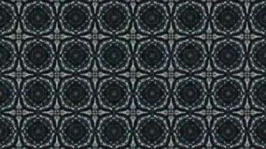 Bu video, soyut simetrik görselleri, doğal taş dokularından esinlenerek, kaleydoskopik hareketle akışkan organik kalıplara dönüştürülür. Kusursuz hareket ve dengeli bileşim gizli simetriyi ortaya çıkarıyor.