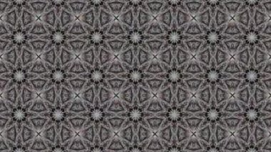 Bu soyut kaleydoskop videosu fütüristik ve modern estetiğe sahip simetrik şekillerin kusursuz bir döngüsünü içeriyor. Dinamik hareket hipnotik görsel bir etki yaratarak hareket grafikleri ve dijital arkaplanlar için ideal hale getiriyor.