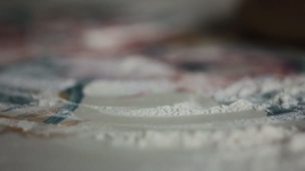 Dolly Shot of Man Hands Kneading Dough on Table. — Stock Video