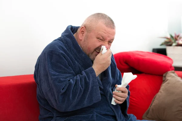 Close-up of a man with tissue in his nose. — Stock Photo, Image