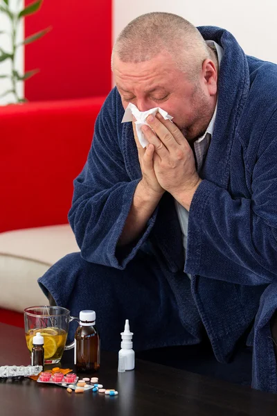 Adult man patient with cold and flu illness relief — Stock Photo, Image