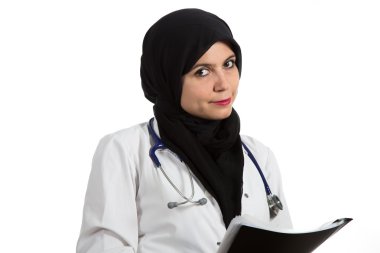 Portrait of young beautiful muslim female doctor holding folder