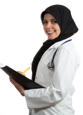 Portrait of young beautiful muslim female doctor holding folder