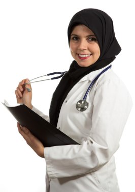 Portrait of young beautiful muslim female doctor holding folder