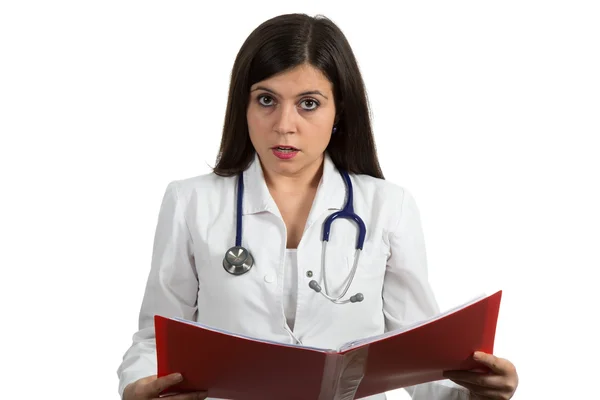 Portrait of young female doctor looking serious — Stock fotografie