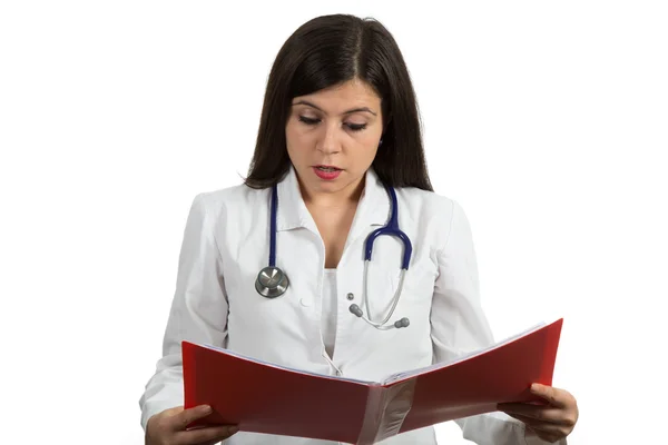 Portrait of young female doctor looking serious Royaltyfria Stockfoton