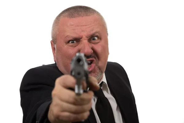 Hombre de negocios de mediana edad apuntando arma — Foto de Stock