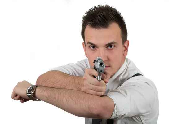 Jonge man met wijzen een pistool — Stockfoto