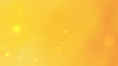 Işıl ışıl küreler ve yumuşak ışık saçan bokeh parçacıkları ile açık sarı arkaplan