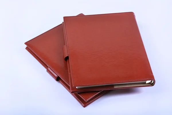 Leather luxury diaries on white background Stock Photo