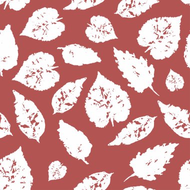 Vector seamless pattern with silhouette of white leaves on vinous background