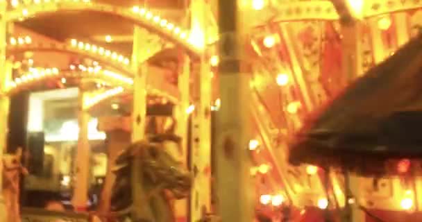 Merry go round lights up the night — Stock Video
