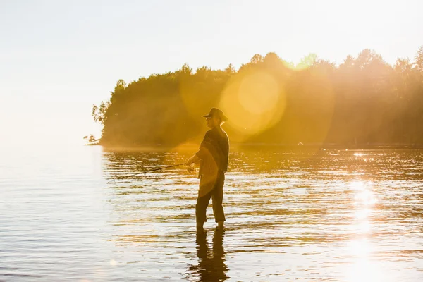 Hombre en sombrero de pesca — Foto de Stock