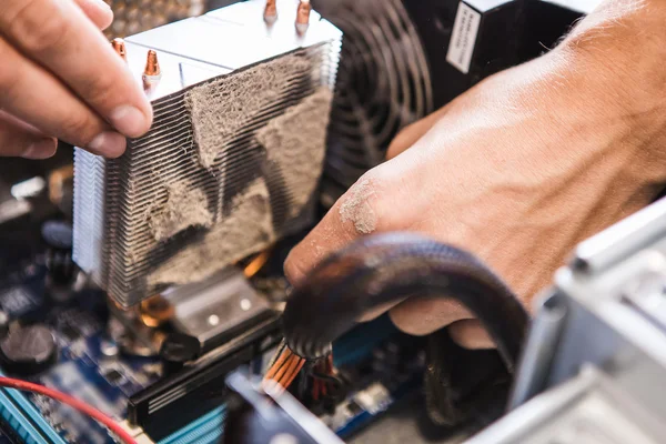 Man holding computer fan — Stock Photo, Image