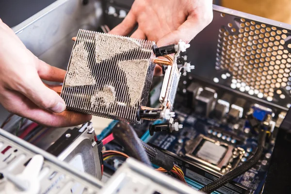 Man holding computer fan — Stock Photo, Image