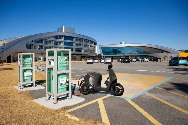 Electric scooter with charging station — 스톡 사진