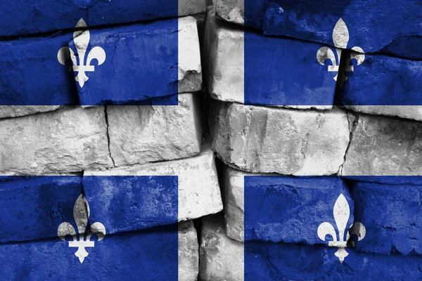 Quebec flag painted on brick wall