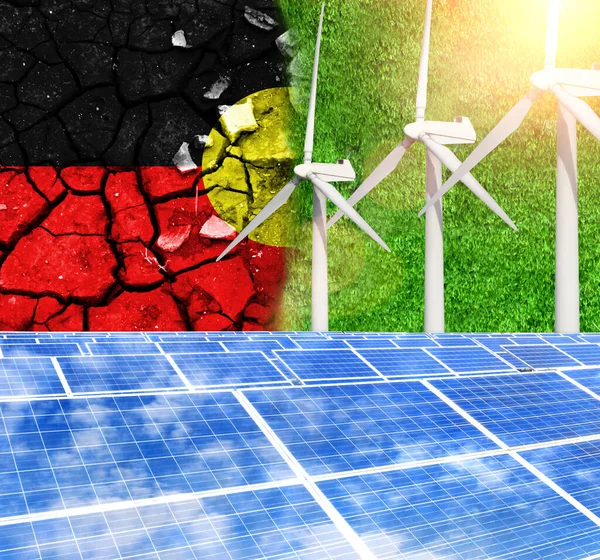 Solar panels on the background with the flag of Australian Aboriginal and Wind Turbine. Switching to renewable energy, wind energy and solar energy