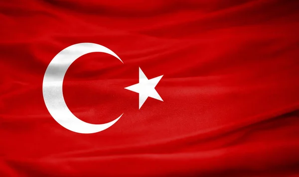 Realistic flag of Turkey on the wavy surface of fabric