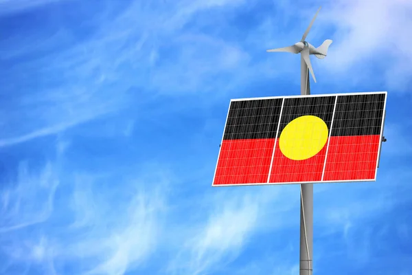 Solar panels against a blue sky with a picture of the flag of Australian Aboriginal